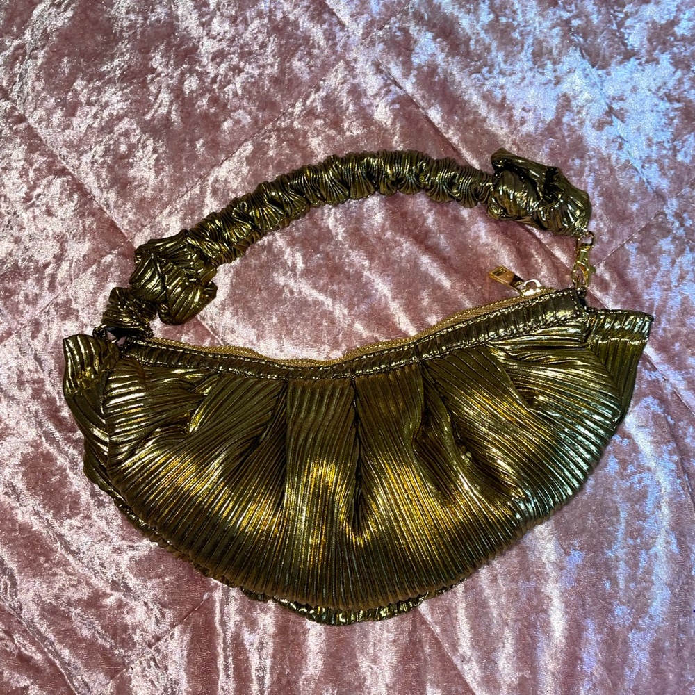 Gold shiny wrist purse